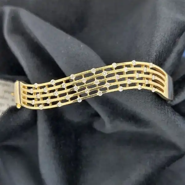 18ct Gold and Diamond Bangle-18ct-yellow-gold-diamond-wave-bangle.webp