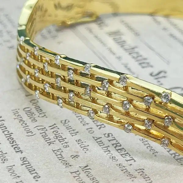 18ct Gold and Diamond Bangle-18ct-yellow-gold-diamond-wave-bangle.webp