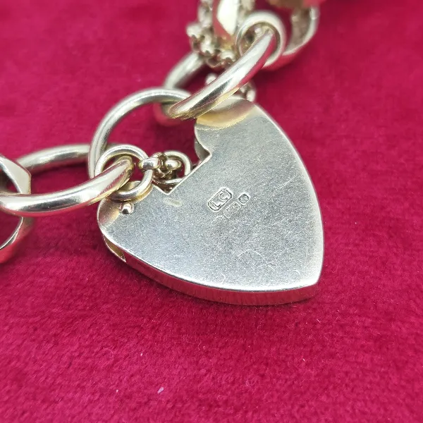 9ct Yellow Gold Chunky Charm Bracelet with Belcher Link-9ct-gold-belcher-charm-bracelet-with-engraved-padlock.webp