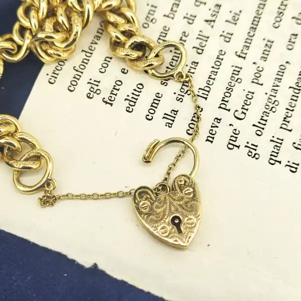 9ct Gold Charm Bracelet with Engraving-9ct-gold-charm-bracelet-with-patterned-padlock.webp