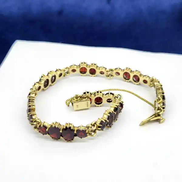 Fancy Garnet Bracelet in 9ct Gold-9ct-gold-garnet-bracelet-with-safety-chain.webp