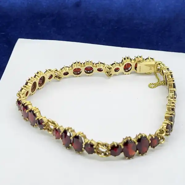 Fancy Garnet Bracelet in 9ct Gold-9ct-gold-garnet-bracelet-with-safety-chain.webp