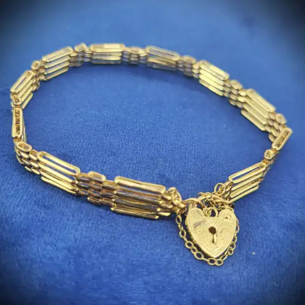 9ct-gold-lightweight-gate-bracelet-engraved-padlock -bracelets