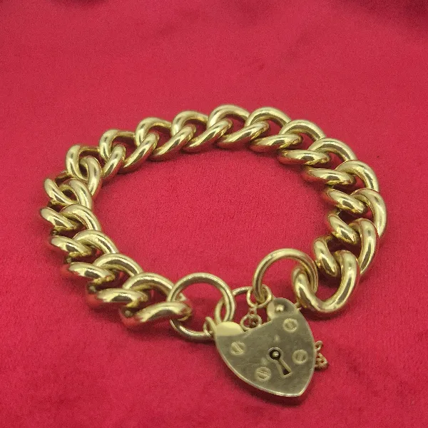Vintage Solid Yellow Gold Charm Bracelet - 75grams-9ct-gold-vintage-chunky-bracelet.webp