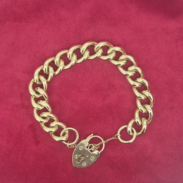 Vintage Solid Yellow Gold Charm Bracelet - 75grams-9ct-gold-vintage-chunky-bracelet.webp