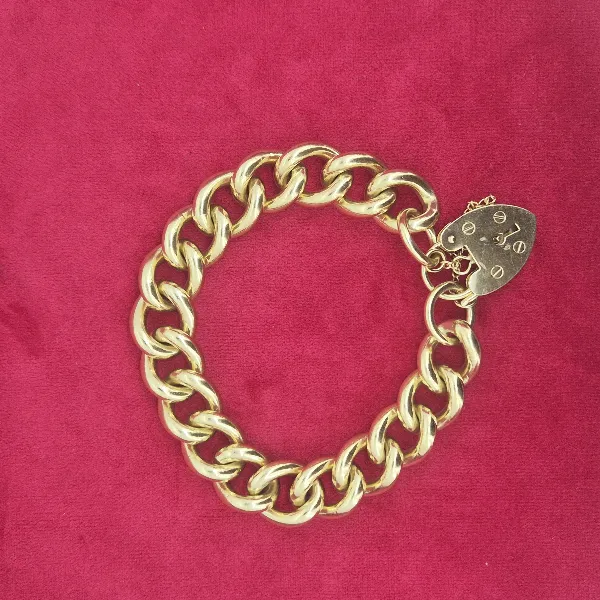 Vintage Solid Yellow Gold Charm Bracelet - 75grams-9ct-gold-vintage-chunky-bracelet.webp