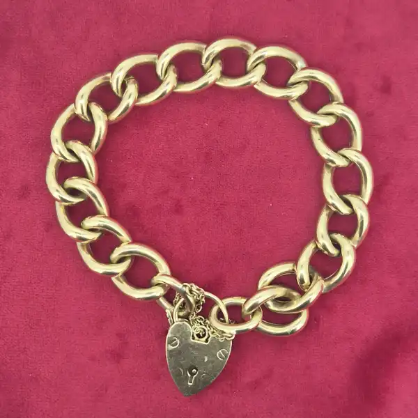 Chunky Yellow Gold Charm Bracelet-chunky-charm-bracelet-in-yellow-gold-double-safety-chains.webp
