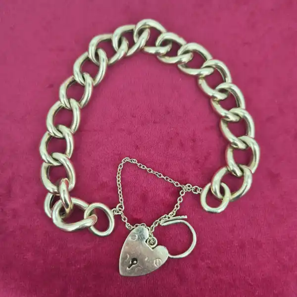 Chunky Yellow Gold Charm Bracelet-chunky-charm-bracelet-in-yellow-gold-double-safety-chains.webp