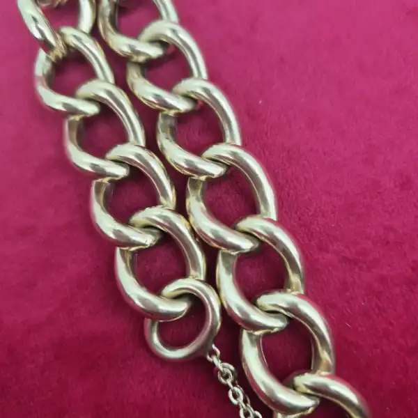Chunky Yellow Gold Charm Bracelet-chunky-charm-bracelet-in-yellow-gold-double-safety-chains.webp