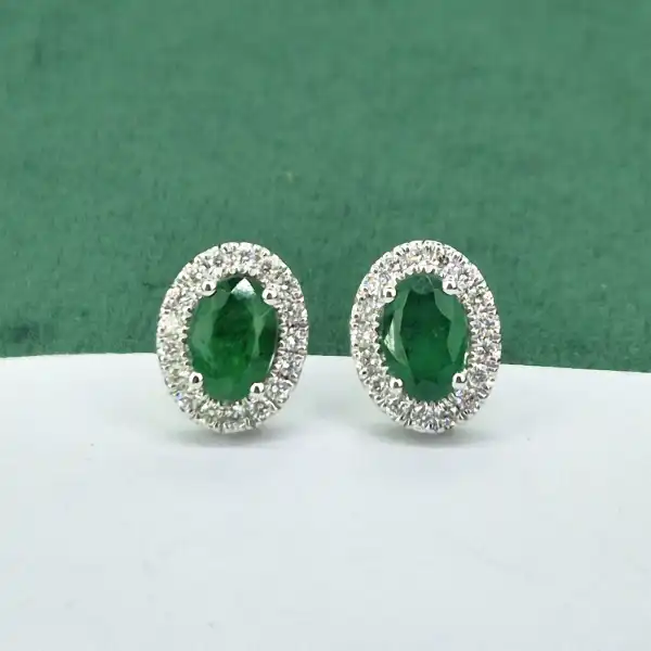 18ct White Gold Emerald & Diamond Oval Stud Earrings-18ct-emerald-dia-oval-halo-studs.webp