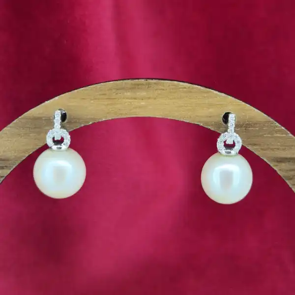 Pearl and Diamond earring in 18ct White Gold-18ct-white-gold-pink-pearl-studs-with-diamonds.webp