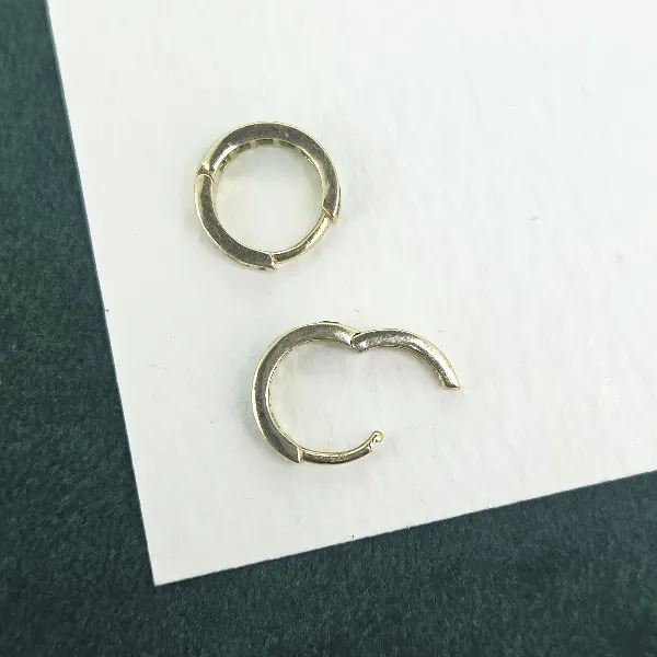 9ct Gold 11mm Emerald Green CZ Huggie Earrings-9ct-yellow-gold-green-cz-huggie-earrings.webp