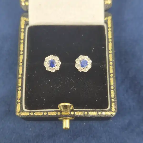 Floral Sapphire and Diamond Cluster Earrings in 18ct White Gold-sapphire-diamond-floral-cluster-studs-in-white-gold.webp