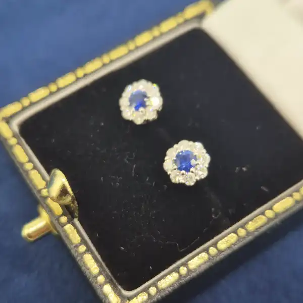 Floral Sapphire and Diamond Cluster Earrings in 18ct White Gold-sapphire-diamond-floral-cluster-studs-in-white-gold.webp