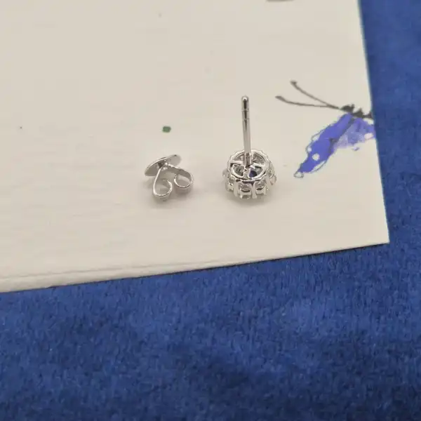 Floral Sapphire and Diamond Cluster Earrings in 18ct White Gold-sapphire-diamond-floral-cluster-studs-in-white-gold.webp