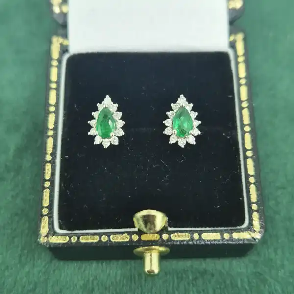 Diamond and Emerald Pear Drop Earrings in 18ct White Gold-white-gold-teardrop-emerald-diamond-studs.webp