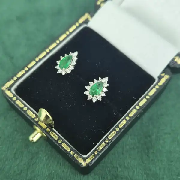 Diamond and Emerald Pear Drop Earrings in 18ct White Gold-white-gold-teardrop-emerald-diamond-studs.webp