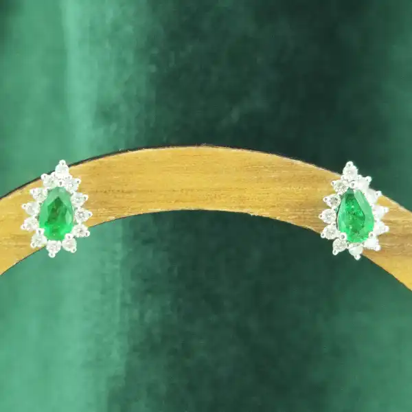 Diamond and Emerald Pear Drop Earrings in 18ct White Gold-white-gold-teardrop-emerald-diamond-studs.webp