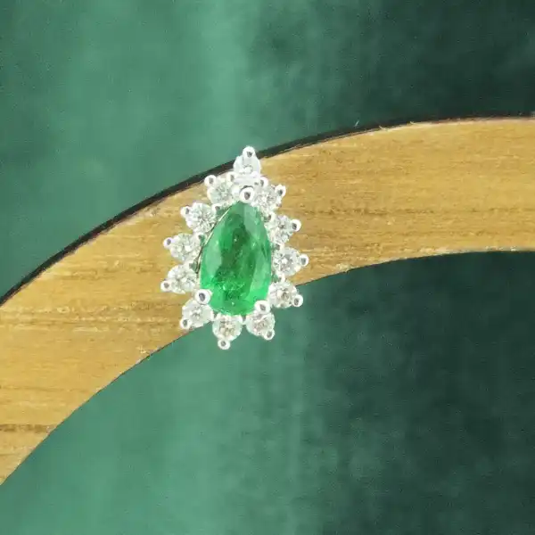Diamond and Emerald Pear Drop Earrings in 18ct White Gold-white-gold-teardrop-emerald-diamond-studs.webp
