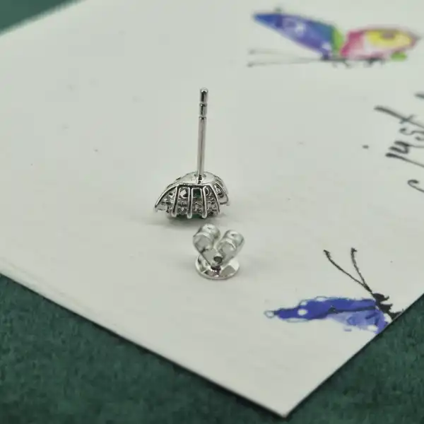 Diamond and Emerald Pear Drop Earrings in 18ct White Gold-white-gold-teardrop-emerald-diamond-studs.webp