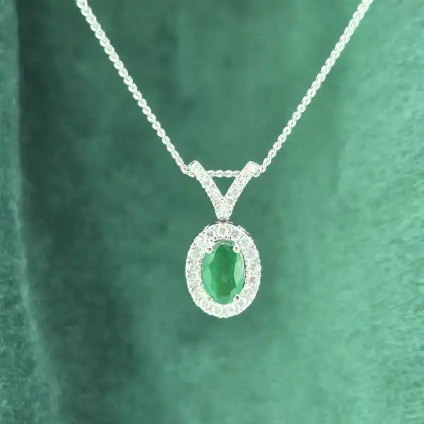 18ct White Gold Emerald & Diamond Halo Pendant-18ct-oval-emerald-diamond-halo-pendant-split-bale.webp