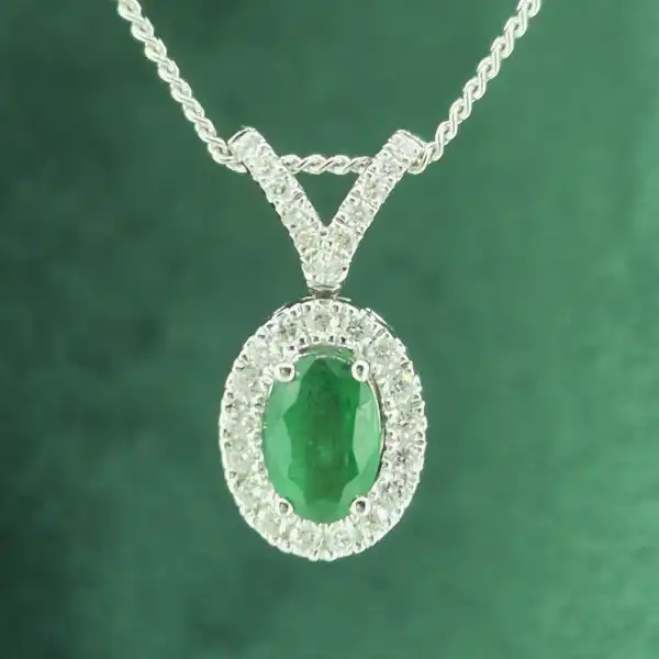 18ct White Gold Emerald & Diamond Halo Pendant-18ct-oval-emerald-diamond-halo-pendant-split-bale.webp