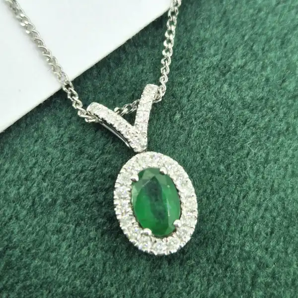 18ct White Gold Emerald & Diamond Halo Pendant-18ct-oval-emerald-diamond-halo-pendant-split-bale.webp