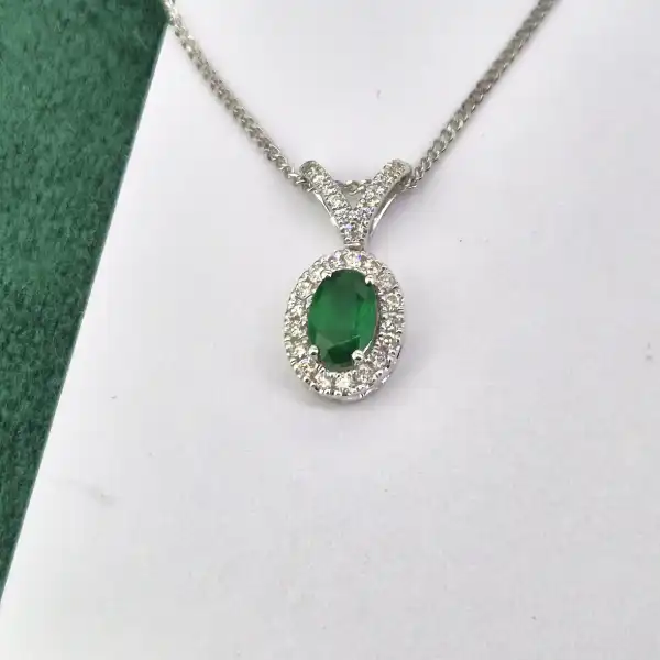 18ct White Gold Emerald & Diamond Halo Pendant-18ct-oval-emerald-diamond-halo-pendant-split-bale.webp