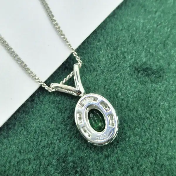 18ct White Gold Emerald & Diamond Halo Pendant-18ct-oval-emerald-diamond-halo-pendant-split-bale.webp