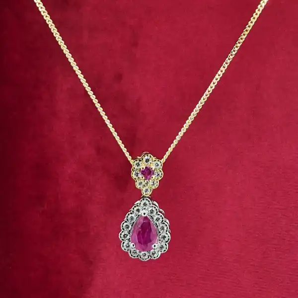18ct Gold Ruby & Diamond Pendant-18ct-ruby-and-diamond-pear-shape-halo-pendant.webp
