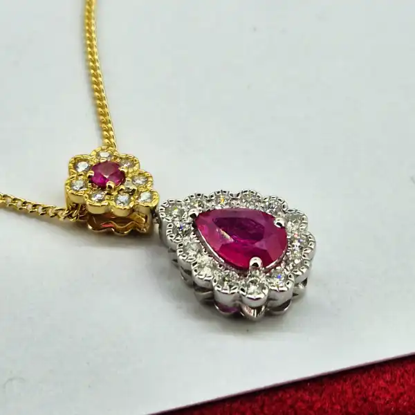 18ct Gold Ruby & Diamond Pendant-18ct-ruby-and-diamond-pear-shape-halo-pendant.webp