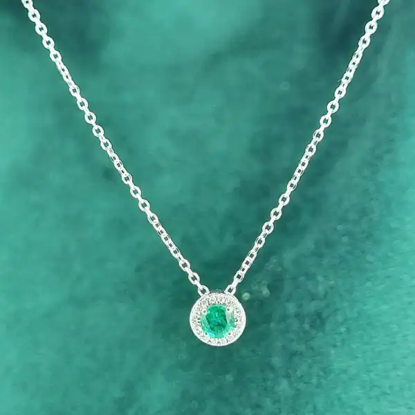 18ct White Gold Emerald & Diamond Halo Pendant-18ct-white-gold-emerald-and-diamond-halo-pendant.webp
