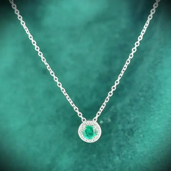 diamond Stock: 18ct White Gold Emerald & Diamond Halo Pendant