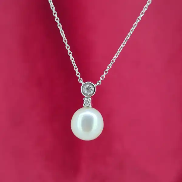 18ct White Gold Diamond and Pearl Necklace-18ct-white-gold-pearl-and-diamond-drop-necklace.webp