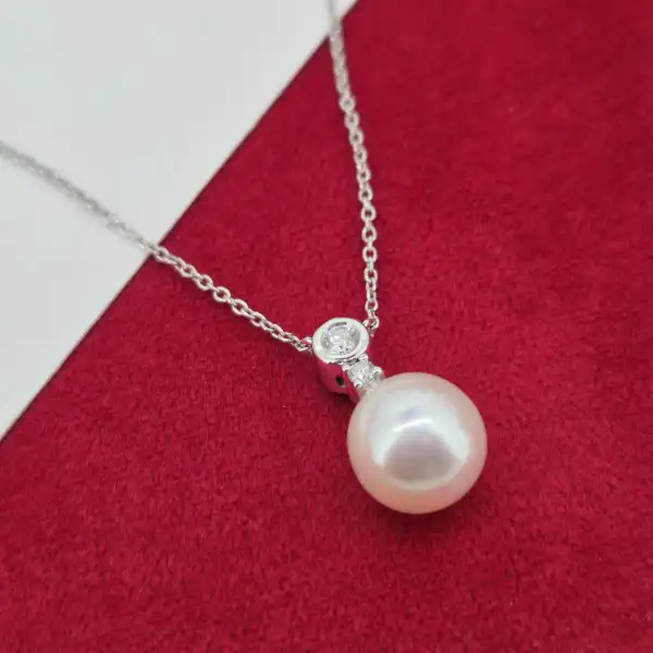 18ct White Gold Diamond and Pearl Necklace-18ct-white-gold-pearl-and-diamond-drop-necklace.webp