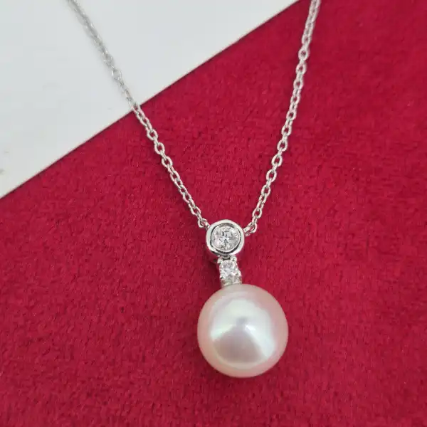 18ct White Gold Diamond and Pearl Necklace-18ct-white-gold-pearl-and-diamond-drop-necklace.webp