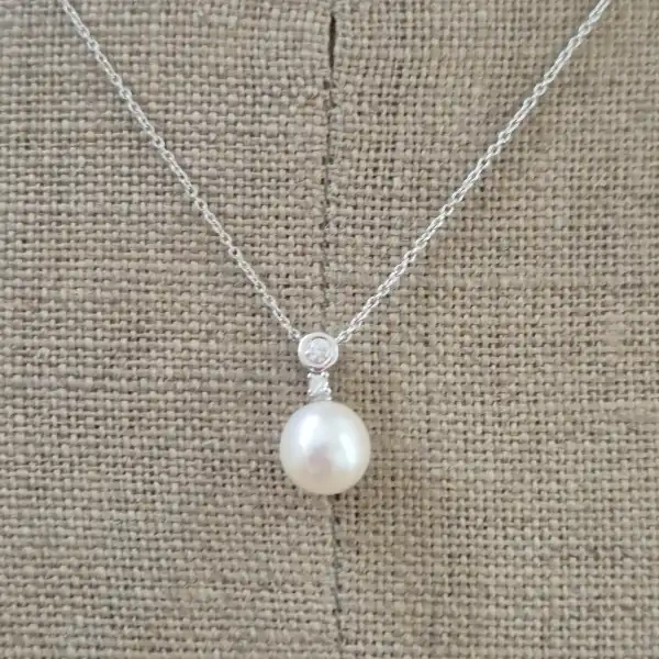 18ct White Gold Diamond and Pearl Necklace-18ct-white-gold-pearl-and-diamond-drop-necklace.webp