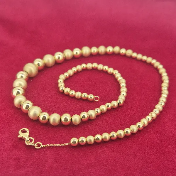 18ct Yellow Gold Bead Necklace-18ct-yellow-gold-polished-satin-bead-necklace.webp