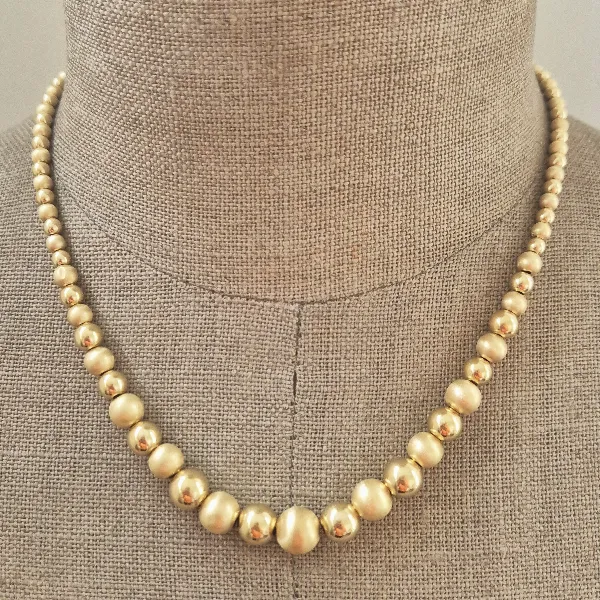 18ct Yellow Gold Bead Necklace-18ct-yellow-gold-polished-satin-bead-necklace.webp