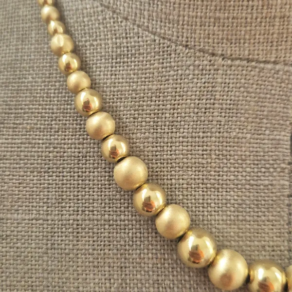 18ct Yellow Gold Bead Necklace-18ct-yellow-gold-polished-satin-bead-necklace.webp