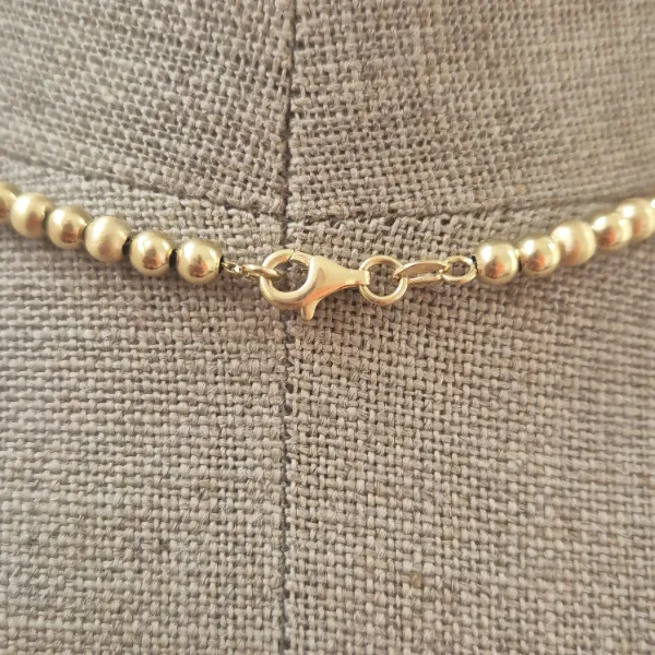 18ct Yellow Gold Bead Necklace-18ct-yellow-gold-polished-satin-bead-necklace.webp
