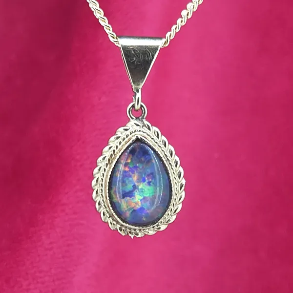 9ct Gold Opal Pendant-9ct-gold-pear-shape-opal-pendant-rope-design.webp