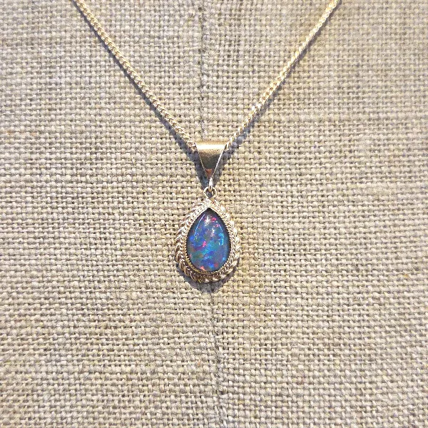 9ct Gold Opal Pendant-9ct-gold-pear-shape-opal-pendant-rope-design.webp