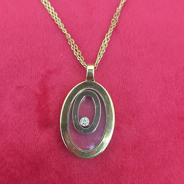 Chopard Happy Spirit One Piece Oval Diamond Necklace in Yellow Gold- Close Up 