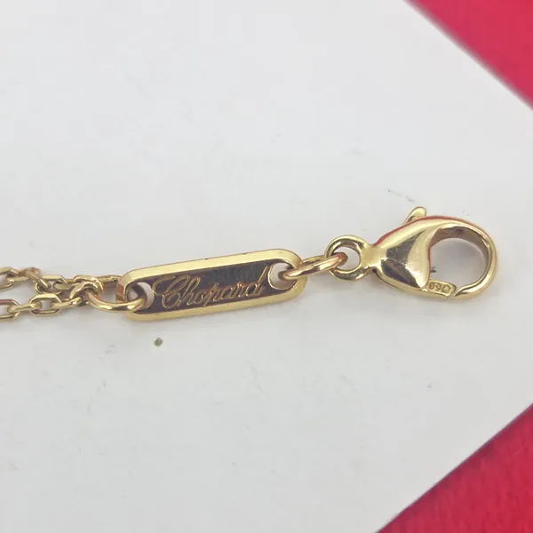 Chopard Happy Spirit One Piece Oval Diamond Necklace in Yellow Gold-Left View 
