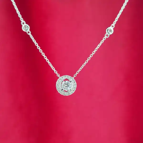 18ct White Gold and Diamond Pendant-diamond-halo-necklace-in-white-gold.webp