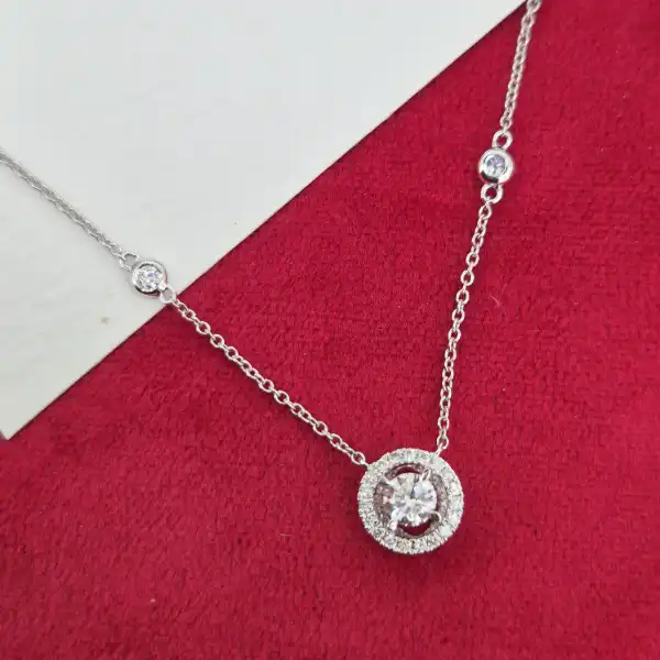 18ct White Gold and Diamond Pendant-diamond-halo-necklace-in-white-gold.webp
