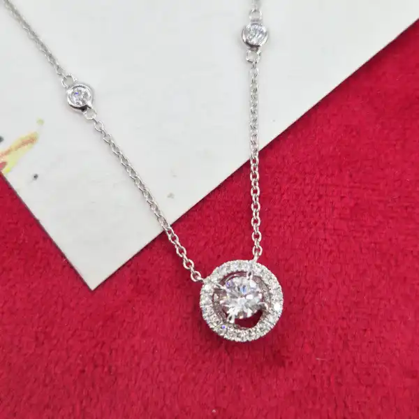 18ct White Gold and Diamond Pendant-diamond-halo-necklace-in-white-gold.webp