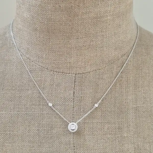 18ct White Gold and Diamond Pendant-diamond-halo-necklace-in-white-gold.webp