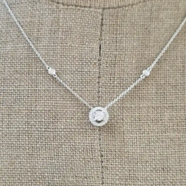 18ct White Gold and Diamond Pendant-diamond-halo-necklace-in-white-gold.webp